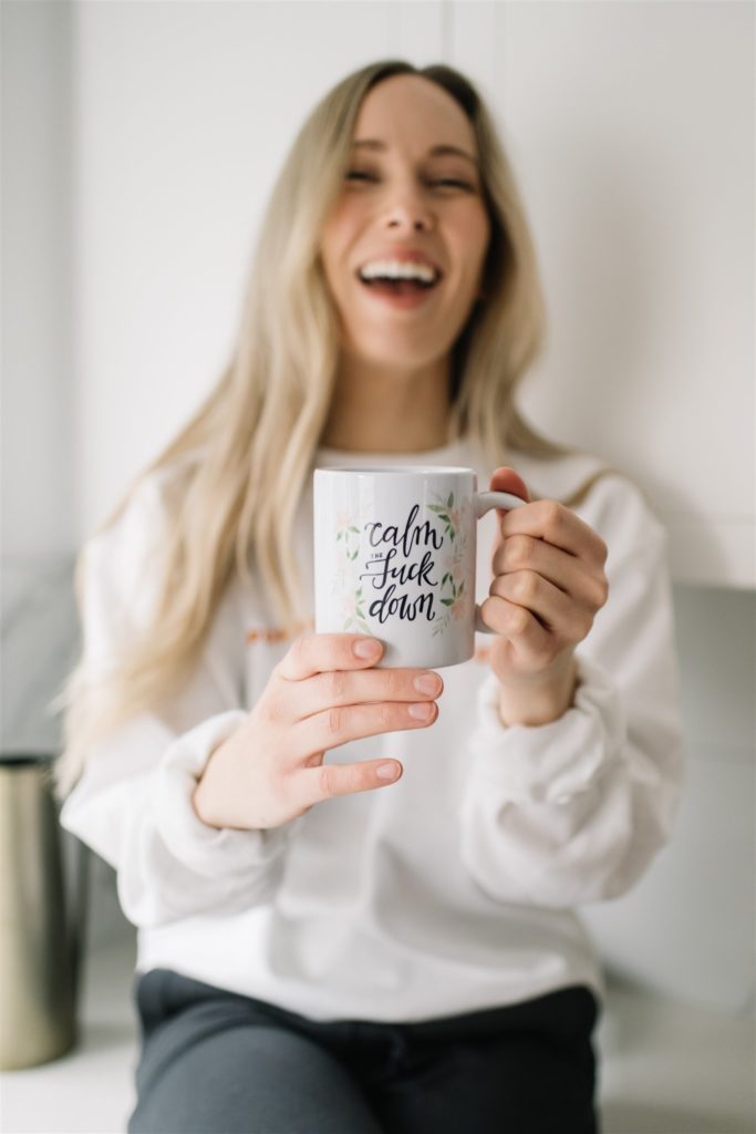 A mug stating "Calm the fuck down," purchased at an Edmonton boutique.